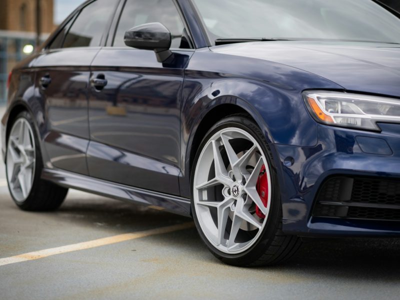 blue bmw m 3 on road